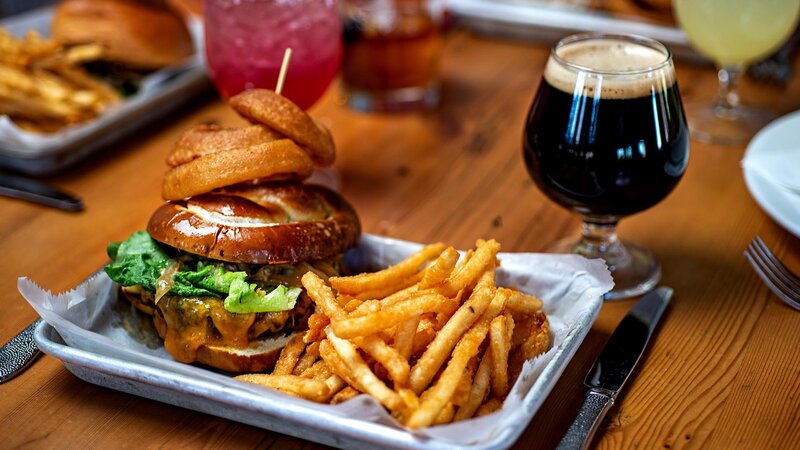 OMG Burger with side of french fries and onion rings