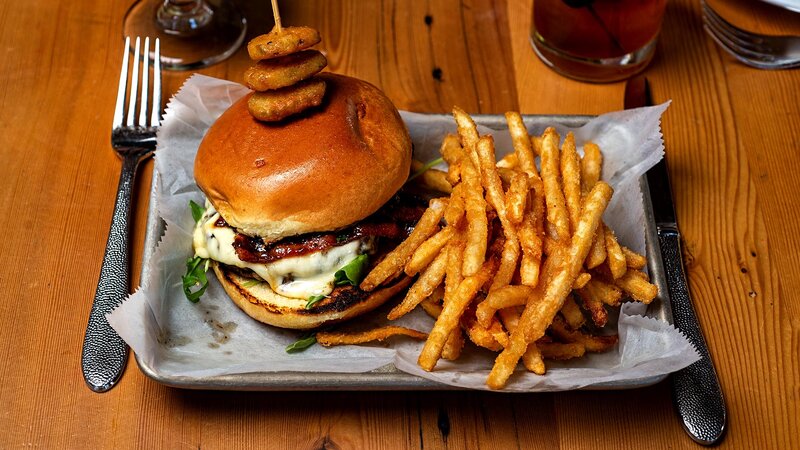 Gouda burger with french fries and fried pickles