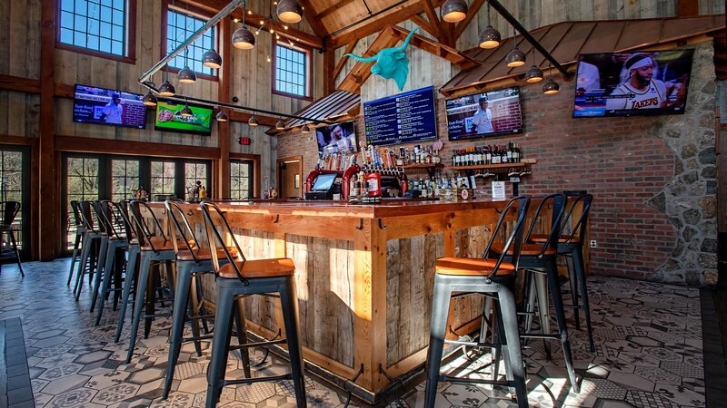 Bar area with multiple televisions