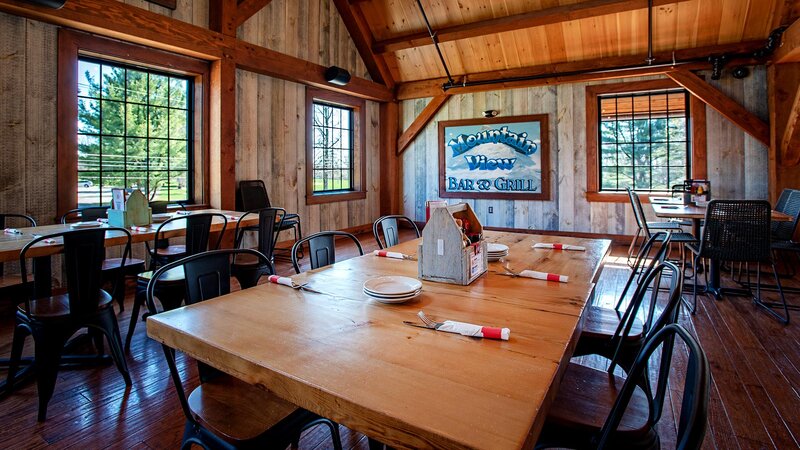 Upstairs dining room with focus on table set for six